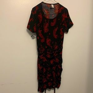 This H&M dress is adjustable at the the bottom and is red and black with tigers.